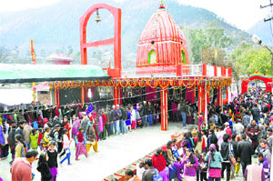 Devotees throng the Bhootnath temple on the occasion of Mahashivratri in Kullu on Thursday.