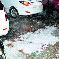 Hailstones accumulated on a street