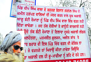 The banner put up by Naujawan Bharat Sabha in Deep Singh Wala village barring the entry of Akali leaders; (inset) the Pakistani immigrant, Jarnail Singh.