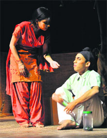 Artistes enact a scene from the play 'Sukki Kukh' at the Punjab Kala Bhawan in Sector 16 on Friday.