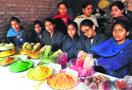Students prepare eco-friendly Holi colours at a workshop in Chandigarh on Friday.