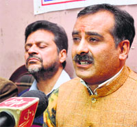 Members of the All Parties Migrants Coordination Committee address mediapersons in Jammu on Friday. 