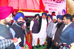 Deputy CM lays the foundation stone of the sewerage and water supply project in Khanna on Friday. A tribune photograph