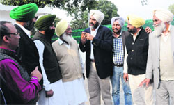 Manpreet Badal with PPP central committee members at his residence in Chandigarh on Friday. Tribune photo: Manoj Mahajan