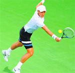 Berdych makes a return en route his straight-sets win over Phillip Kohlschreiber of Germany in the semifinals on Friday. Reuters