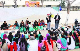 Contractual nurses and paramedical staff lodging a protest outside Cabinet Minister Anil Joshis office in Amritsar on Saturday