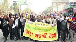 Members of Medical Practitioners Association hold a protest march against the Punjab Government in Bathinda on Saturday. Tribune photo: Pawan Sharma