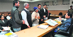 SK Aggarwal, District and Sessions Judge, listens to a matrimonial case during a lok adalat at the District Courts in Sector 43, Chandigarh, on Saturday. Tribune photo: Parvesh Chauhan