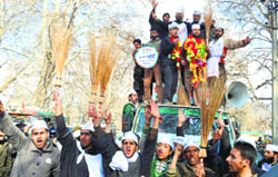 AAP candidate Raja Muzaffar Bhat addresses supporters in Srinagar on Saturday. Tribune Photo: Amin War
