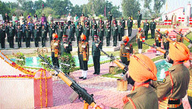 Lt Gen AK Bakshi, General Officer Commanding Vajra Corps pays homage during celebrations of 65th Raising Day in Jalandhar Cantt on Saturday.