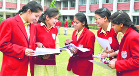 Students discuss the paper on the first day of the CBSE examinations in Ludhiana on Saturday.