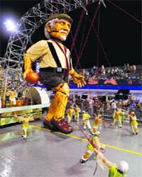 Revellers from the Vai Vai Samba School take part in the annual Carnival parade in Brazil on Saturday