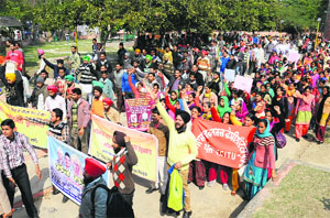 Members of various organisations hold a protest at the Nehru Childrens Park.