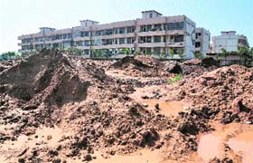 Heaps of mud lying in Sector 50