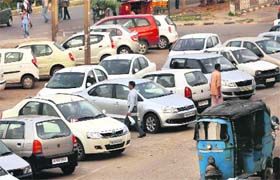 Vehicles parked in a haphazard manner at Sector 10 market in Panchkula