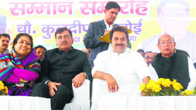 HJC supremo Kuldeep Bishnoi flanked by Dharam Pal Singh (right) Malik and Ramesh Khurana in a samman samaroh at Gohana on Sunday.