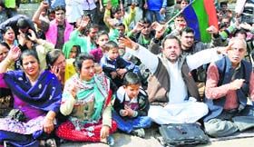 Members of the Bhartiya Chaitanya Party hold a protest in Jammu on Sunday