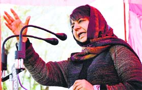 PDP leader Mehbooba Mufti addresses party workers on the outskirts of Jammu on Sunday
