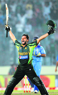 Shahid Afridi celebrates after winning the tense game for Pakistan. He finished off the match in his characteristic style, hitting two successive sixes off Ashwin in the last over