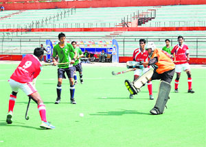 Puducherry (in red) beat Assam 11-1 in the Senior Men National Championship in Lucknow on Sunday.