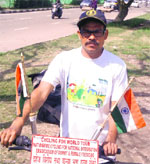 Bhau Saheb Bhawar with his bicycle in Chandigarh. A Tribune photograph