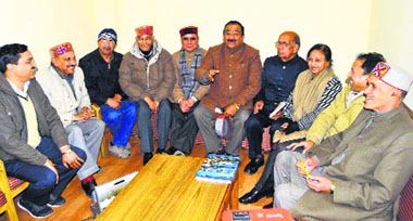 HLP president Maheshwar Singh (in action) during the core committee meeting in Shimla on Monday.