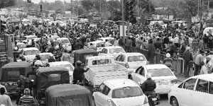 Villagers block the Mohali- Kharar highway on Tuesday. 