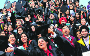 Students in a jubilant mood after receiving their degrees during the convocation at the GGDSD College, Sector 32, Chandigarh, on Tuesday.