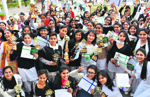 Students in a jubilant mood during the prize distribution function of the Post Graduate Government College for Girls, Sector 11, Chandigarh, on Tuesday. 