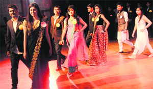 Students take part in a fashion show during a freshers party at Post Graduate Government College in Sector 46, Chandigarh, on Tuesday. 