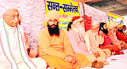 Vishwa Hindu Parishad convener Ashok Singhal along with saints at a convention at Shri Panchayati Udasin Naya Akhada at Kankhal in Haridwar on Monday