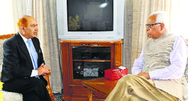 Governor NN Vohra with Rafiq Fida, acting chairperson of the J&K State Human Rights Commission, at Raj Bhawan in Jammu on Tuesday. 