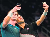 Selfie geeks: Andy Murray and Novak Djokovic stop to take a selfie during their exhibition match at Madison Square Garden in New York