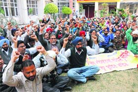 Ministerial staff raise slogans against the government in Bathinda on Wednesday