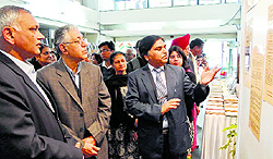 PU Vice-Chancellor Arun K Grover (second from left) at an exhibition on the Ghadar Party at Panjab University on Wednesday