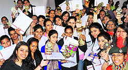 Students in a jubilant mood during the prize distribution function at the Dev Samaj College for Women, Sector 45, on Wednesday