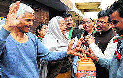Punjab president Kamal Sharma, along with party workers, begins a door-to-door campaign at Phase IX, Mohali, on Wednesday