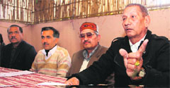 President of the Uttarakhand Jat Mahasabha Om Pal Singh Rathi addresses a press conference in Dehradun on Wednesday. A Tribune photograph 