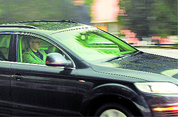 Chief Minister Omar Abdullah drives through rain in Jammu on Wednesday