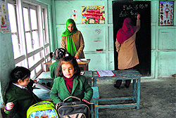 Toddlers attend a class after vacation in Srinagar