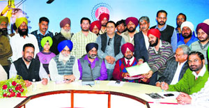 Members of the UCPMA apply for power connections in Ludhiana on Wednesday.