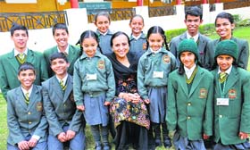 A group of twins with principal Jasbir Wadhwa on the campus of Sri Guru Harkrishan Public School in Kapurthala on Wednesday