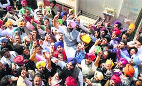 Simarjit Bains (in pink turban), with supporters in Ludhiana on Wednesday