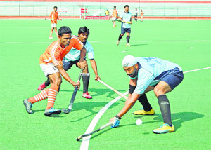 Central Reserve Police Force (in blue) beat Vidarbha Hockey Association 4-0 in the Nationals on Wednesday. 