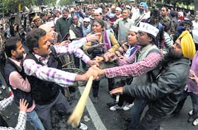 AAP and BJP supporters came to blows at the BJP headquarters in New Delhi on Wednesday