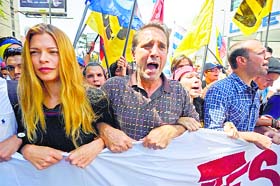 Venezuelan actors take part in a protest against the government of Venezuelan President Nicolas Maduro in Caracas on Tuesday