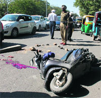 Victim Bhag Singhs scooter at the accident spot.