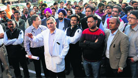 Doctors stage a protest against the alleged assault on medical students by the Uttar Pradesh police in Kanpur, at Chandigarh on Thursday.