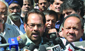 BJP leader Mukhtar Abbas Naqvi, Dr Harsh Vardhan and others speak to the media after registering a complaint against the Aam Aadmi Party at the Election Commission in New Delhi on Thursday.