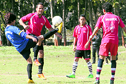 Players vie for the ball in the Narayan Gurung Memorial Football Tournament at the Mahendra ground in Dehradun on Thursday